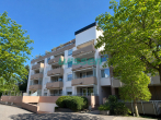 Außenansicht - 3-Zimmer Wohnung mit schöner Loggia und Potential – Mit Einbauküche & TG-Stellplatz!